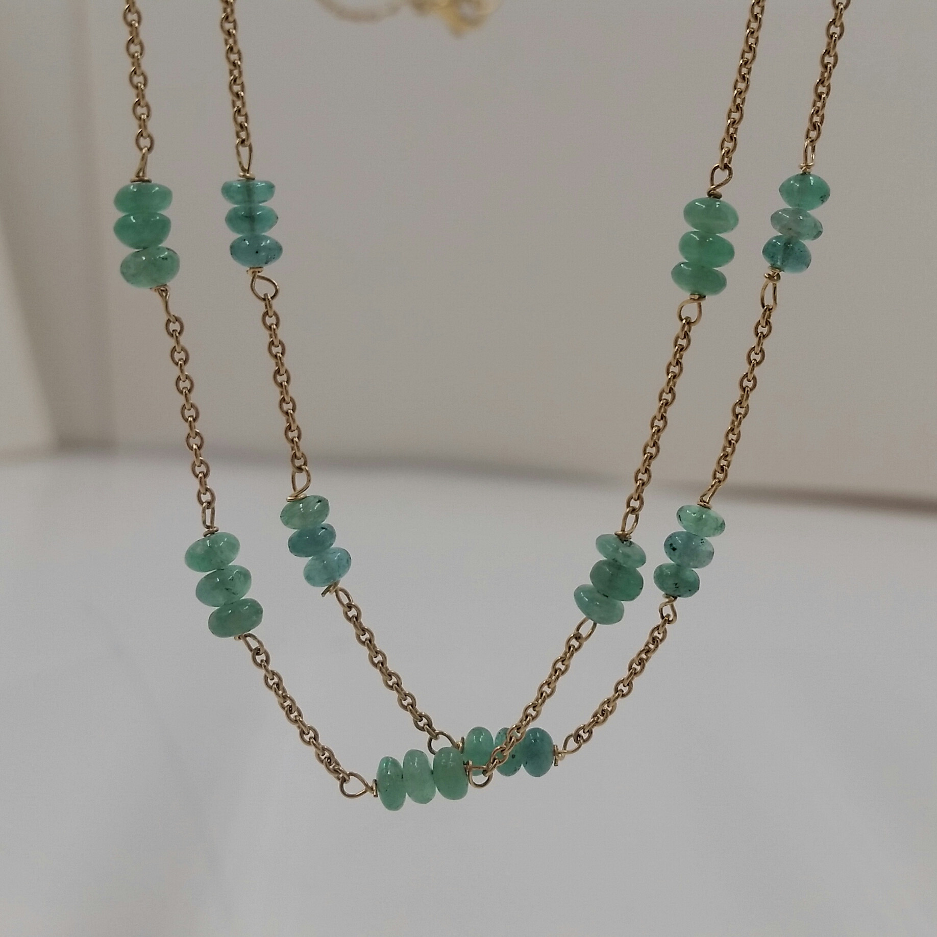 14 Karat Yellow Gold Double Strand Necklace with Stations of Emerald ...