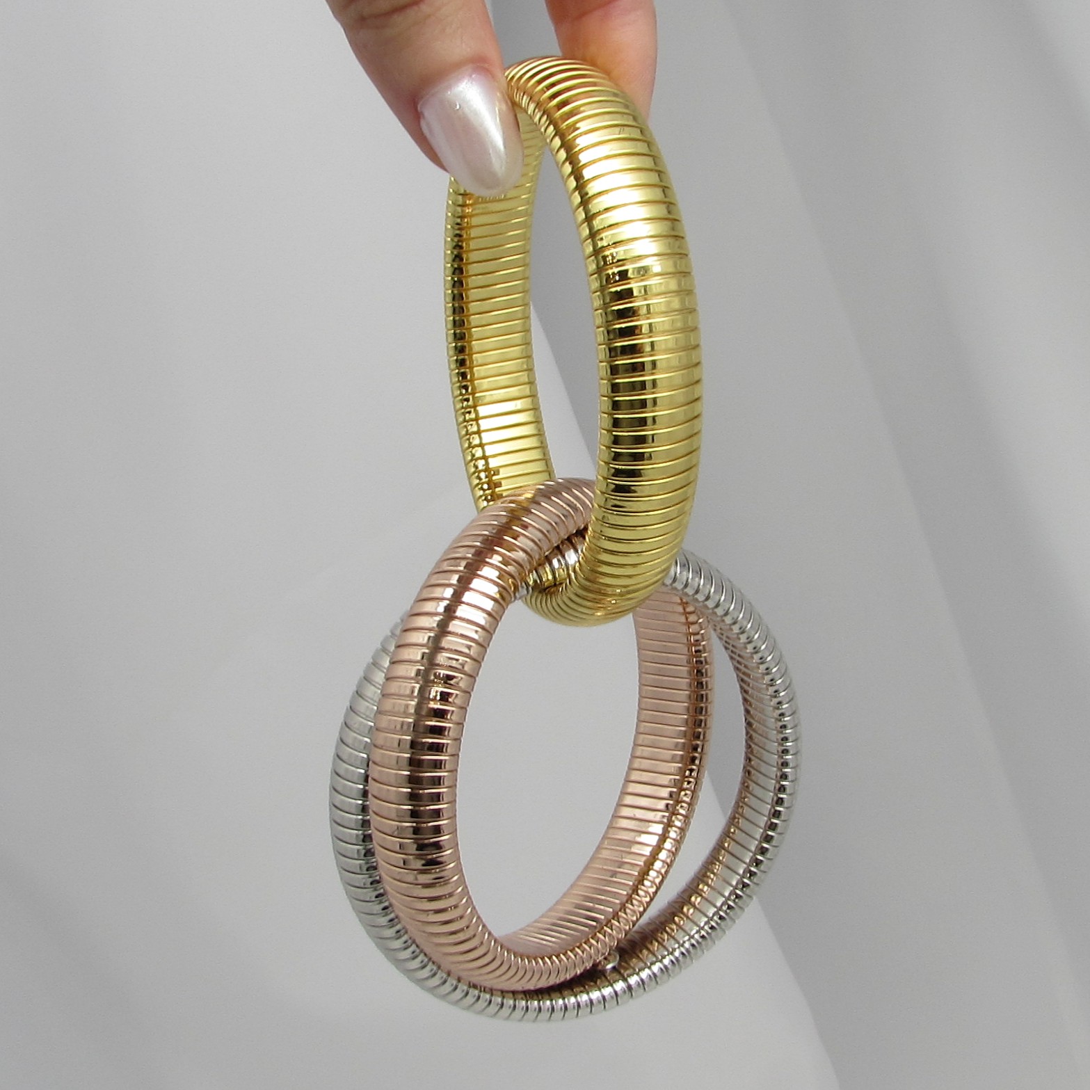 Gold, Silver & Rose Plated Triple Coil Bracelet - Image 7